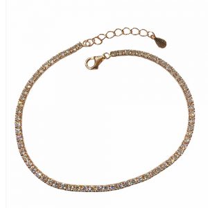 Bracciale Tennis donna NB Gioielli BRNBTNG  realizzato in argento 925% dorato e decorato con cristalli bianchi. La chiusura è a moschettone. 